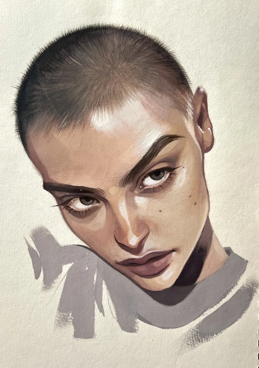 Portrait of a woman with a shaved head